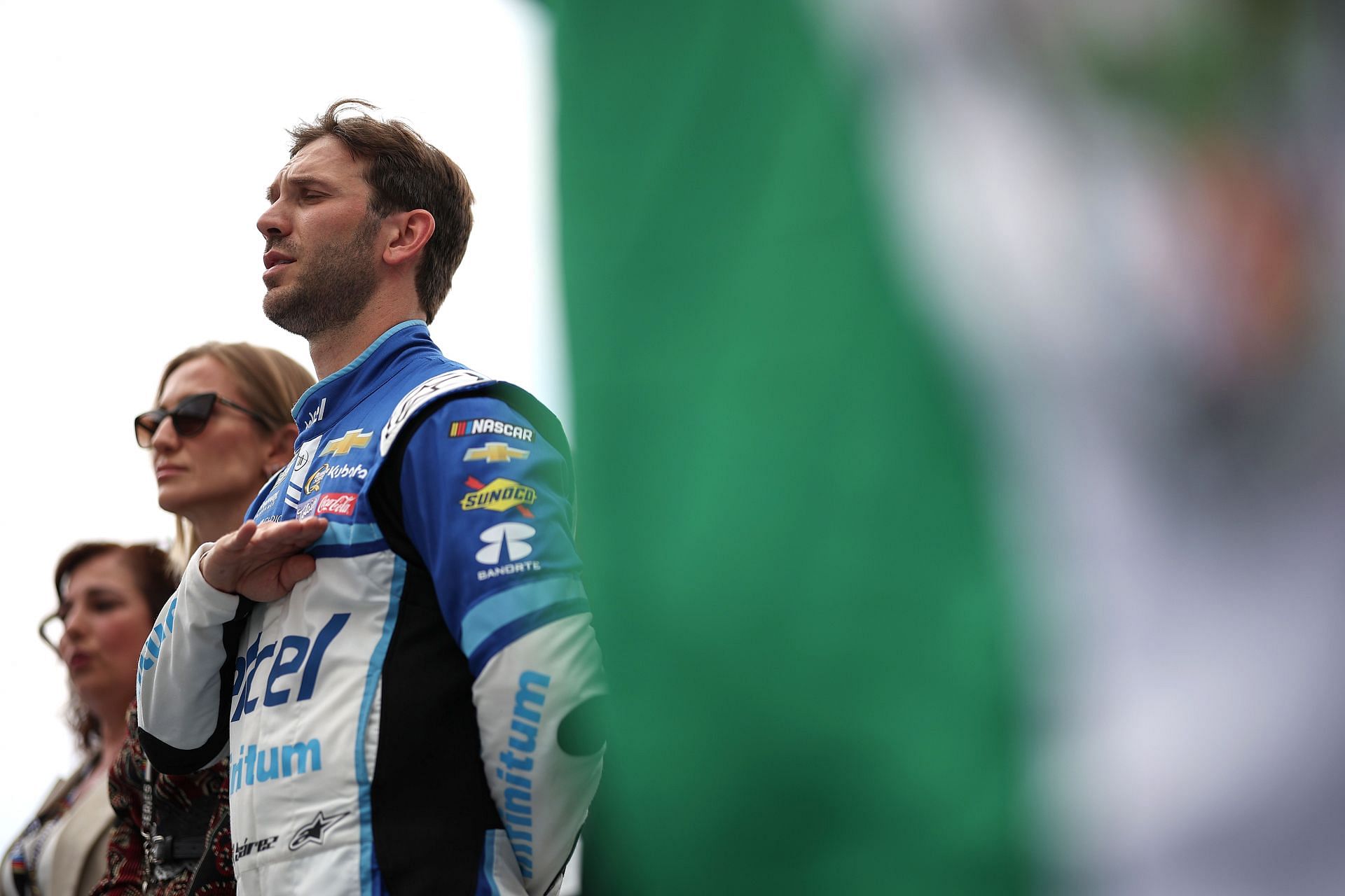 Daniel Suarez during the national anthem before the NASCAR Cup Series Viva Mexico 250. Source: Getty